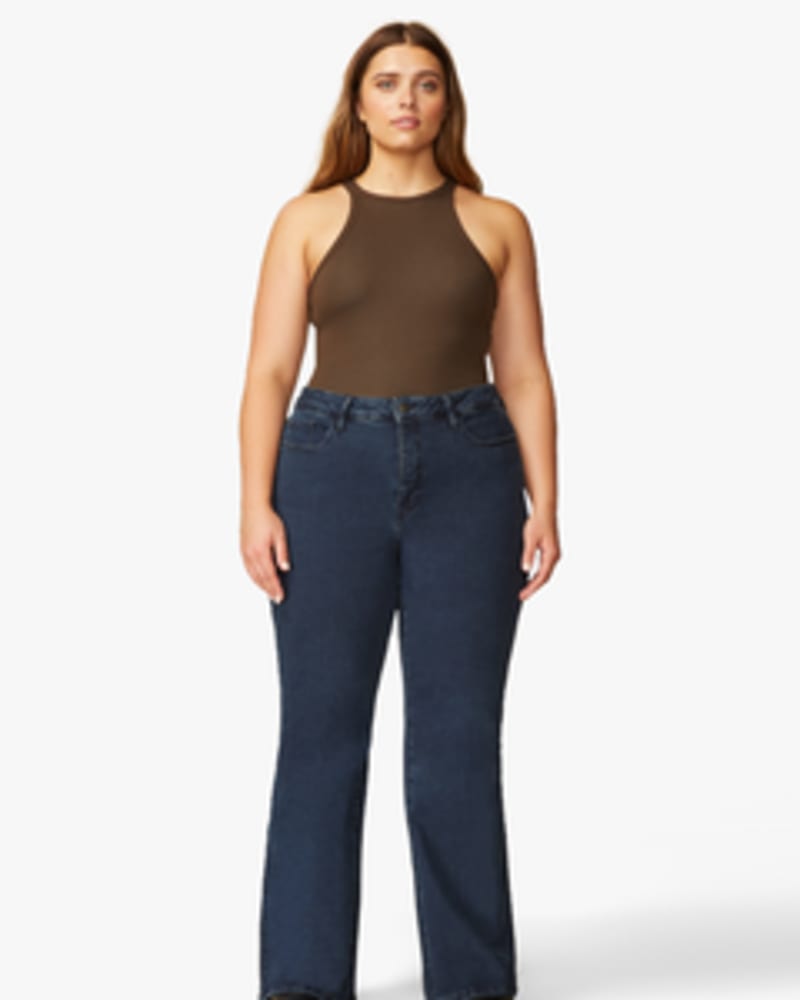 Front of a model wearing a size 14 Mia Flared Jeans in MULHOLLAND by Warp + Weft. | dia_product_style_image_id:248946